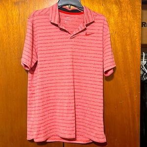 Good condition. No rips.  Men’s dri-fit polo shirt.